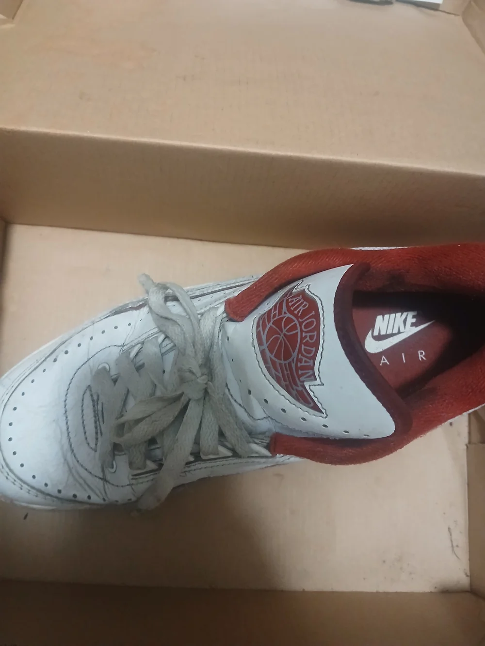 Nike Air Jordan White and Red Sneakers